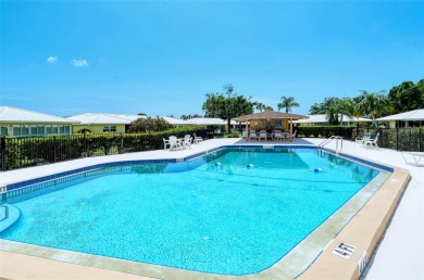 NEW PICTURES Welcome to Village Green! Here is the opportunity on Village Green Golf Club of Sarasota in Florida - for sale on GolfHomes.com, golf home, golf lot