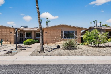 FURNISHED AND READY FOR YOU!!  This sunny, bright end unit in on Stardust Golf Course in Arizona - for sale on GolfHomes.com, golf home, golf lot