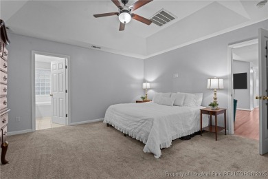 Lakefront living at its finest. Welcome to this beautiful on Carolina Lakes Country Club in North Carolina - for sale on GolfHomes.com, golf home, golf lot