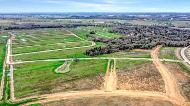 Build your custom home on this beautiful corner lot located in on Rock Creek Golf Club in Texas - for sale on GolfHomes.com, golf home, golf lot