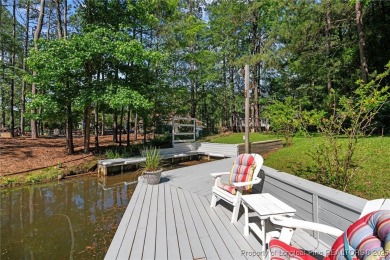 Lakefront living at its finest. Welcome to this beautiful on Carolina Lakes Country Club in North Carolina - for sale on GolfHomes.com, golf home, golf lot