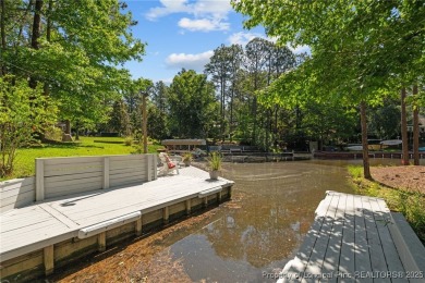 Lakefront living at its finest. Welcome to this beautiful on Carolina Lakes Country Club in North Carolina - for sale on GolfHomes.com, golf home, golf lot