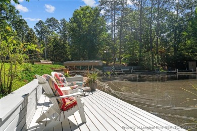 Lakefront living at its finest. Welcome to this beautiful on Carolina Lakes Country Club in North Carolina - for sale on GolfHomes.com, golf home, golf lot