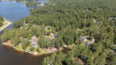 Lakefront living at its finest. Welcome to this beautiful on Carolina Lakes Country Club in North Carolina - for sale on GolfHomes.com, golf home, golf lot