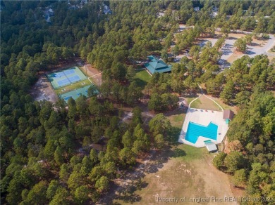 Lakefront living at its finest. Welcome to this beautiful on Carolina Lakes Country Club in North Carolina - for sale on GolfHomes.com, golf home, golf lot