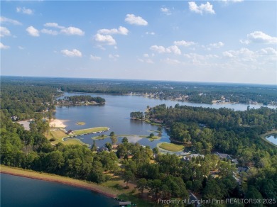 Lakefront living at its finest. Welcome to this beautiful on Carolina Lakes Country Club in North Carolina - for sale on GolfHomes.com, golf home, golf lot