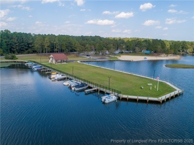Lakefront living at its finest. Welcome to this beautiful on Carolina Lakes Country Club in North Carolina - for sale on GolfHomes.com, golf home, golf lot