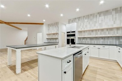 This stunning new construction blends luxury, functionality, and on The Highlands Course at Lake Arrowhead in Georgia - for sale on GolfHomes.com, golf home, golf lot