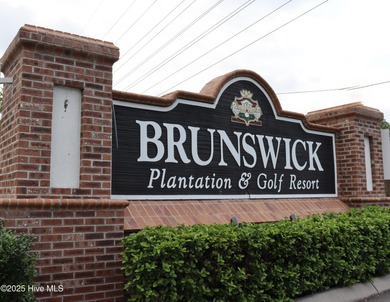 FIRST FLOOR END UNIT! Well maintained, bright and nicely on Brunswick Plantation and Golf Resorts in North Carolina - for sale on GolfHomes.com, golf home, golf lot
