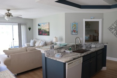 FIRST FLOOR END UNIT! Well maintained, bright and nicely on Brunswick Plantation and Golf Resorts in North Carolina - for sale on GolfHomes.com, golf home, golf lot