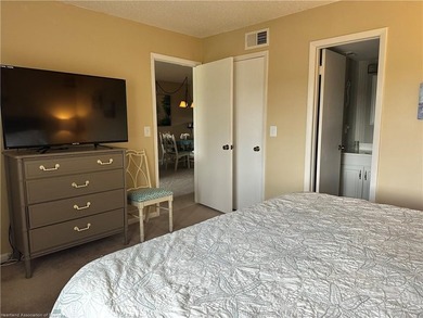 Step into a tastefully, fully furnished 2nd-floor condominium in on Sun n Lake Golf and Country Club in Florida - for sale on GolfHomes.com, golf home, golf lot