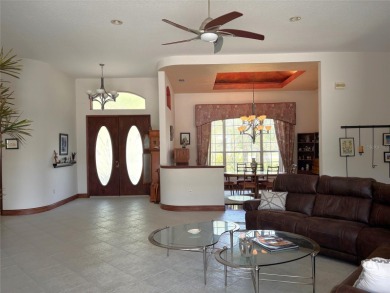 A beautiful LAKE FRONT home in the exclusive Gated Estates of on DeBary Golf and Country Club in Florida - for sale on GolfHomes.com, golf home, golf lot