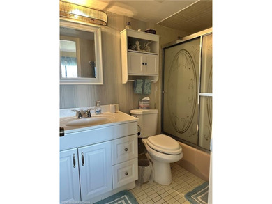 Step into a tastefully, fully furnished 2nd-floor condominium in on Sun n Lake Golf and Country Club in Florida - for sale on GolfHomes.com, golf home, golf lot