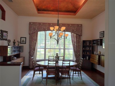 A beautiful LAKE FRONT home in the exclusive Gated Estates of on DeBary Golf and Country Club in Florida - for sale on GolfHomes.com, golf home, golf lot