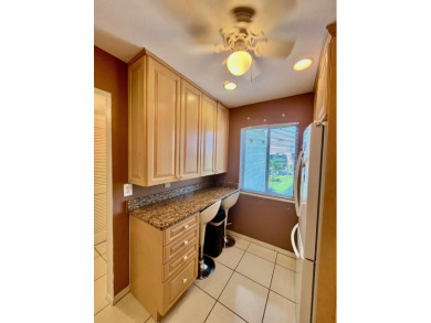 Immaculate, airy, bright turnkey condo (includes all furniture on Fountains Golf and Country Club in Florida - for sale on GolfHomes.com, golf home, golf lot