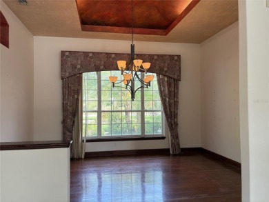 A beautiful LAKE FRONT home in the exclusive Gated Estates of on DeBary Golf and Country Club in Florida - for sale on GolfHomes.com, golf home, golf lot
