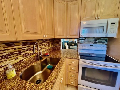 Immaculate, airy, bright turnkey condo (includes all furniture on Fountains Golf and Country Club in Florida - for sale on GolfHomes.com, golf home, golf lot