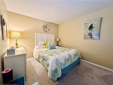 Step into a tastefully, fully furnished 2nd-floor condominium in on Sun n Lake Golf and Country Club in Florida - for sale on GolfHomes.com, golf home, golf lot