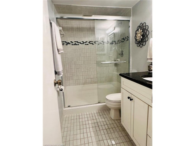 Step into a tastefully, fully furnished 2nd-floor condominium in on Sun n Lake Golf and Country Club in Florida - for sale on GolfHomes.com, golf home, golf lot