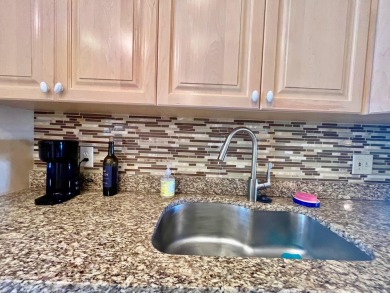 Immaculate, airy, bright turnkey condo (includes all furniture on Fountains Golf and Country Club in Florida - for sale on GolfHomes.com, golf home, golf lot
