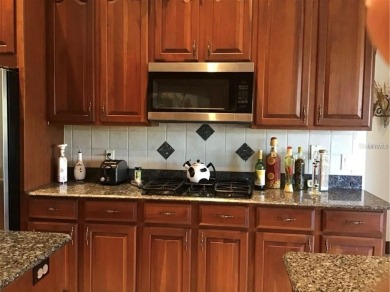 A beautiful LAKE FRONT home in the exclusive Gated Estates of on DeBary Golf and Country Club in Florida - for sale on GolfHomes.com, golf home, golf lot