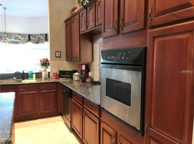 A beautiful LAKE FRONT home in the exclusive Gated Estates of on DeBary Golf and Country Club in Florida - for sale on GolfHomes.com, golf home, golf lot