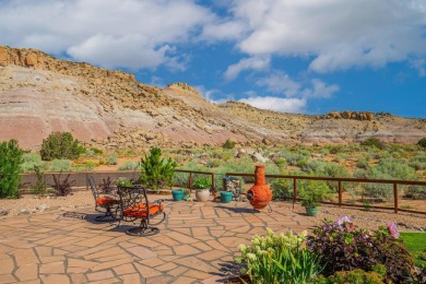Where views, nature and comfort collide in perfect harmony on on The Golf Club At Redlands Mesa in Colorado - for sale on GolfHomes.com, golf home, golf lot