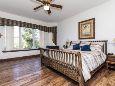 A beautiful LAKE FRONT home in the exclusive Gated Estates of on DeBary Golf and Country Club in Florida - for sale on GolfHomes.com, golf home, golf lot