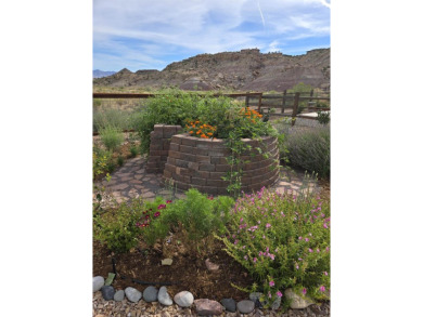 Where views, nature and comfort collide in perfect harmony on on The Golf Club At Redlands Mesa in Colorado - for sale on GolfHomes.com, golf home, golf lot