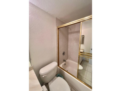 Immaculate, airy, bright turnkey condo (includes all furniture on Fountains Golf and Country Club in Florida - for sale on GolfHomes.com, golf home, golf lot