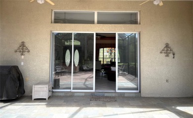 A beautiful LAKE FRONT home in the exclusive Gated Estates of on DeBary Golf and Country Club in Florida - for sale on GolfHomes.com, golf home, golf lot