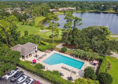 A beautiful LAKE FRONT home in the exclusive Gated Estates of on DeBary Golf and Country Club in Florida - for sale on GolfHomes.com, golf home, golf lot