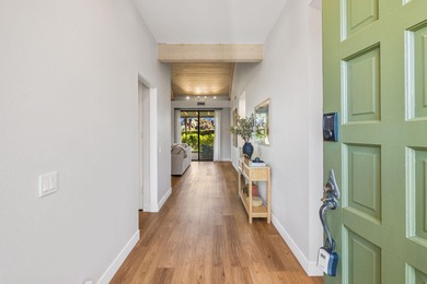 Set behind the guarded gates of Mission Hills Country Club, this on Mission Hills Golf Club in California - for sale on GolfHomes.com, golf home, golf lot