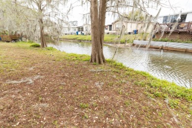 Welcome to this charming canal-front home in Anglers Green on Anglers Green Golf Course in Florida - for sale on GolfHomes.com, golf home, golf lot