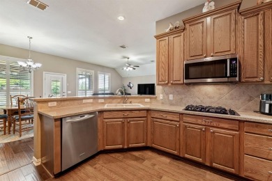 POPULAR BOWIE FLOOR PLAN ON GOLF COURSE - FENCED BACKYARD WITH on Heritage Ranch Golf and Country Club in Texas - for sale on GolfHomes.com, golf home, golf lot