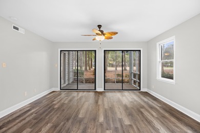 Located within Weehawka Woods in Pawleys Plantation, this condo on Pawleys Plantation Golf and Country Club in South Carolina - for sale on GolfHomes.com, golf home, golf lot