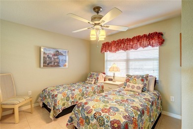 Cozy Plan B 2-bed/2-bath condo with panoramic golf and lake on The American Golf Club in Florida - for sale on GolfHomes.com, golf home, golf lot