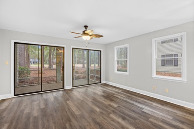 Located within Weehawka Woods in Pawleys Plantation, this condo on Pawleys Plantation Golf and Country Club in South Carolina - for sale on GolfHomes.com, golf home, golf lot