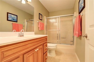 Cozy Plan B 2-bed/2-bath condo with panoramic golf and lake on The American Golf Club in Florida - for sale on GolfHomes.com, golf home, golf lot
