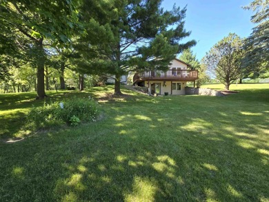 Located in Lake Carroll! Enjoy the privacy from the upper deck on Lake Carroll Golf Course in Illinois - for sale on GolfHomes.com, golf home, golf lot