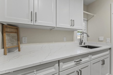 Stunning Gemini Twin home on Union Hills Golf Course with serene on Union Hills Country Club in Arizona - for sale on GolfHomes.com, golf home, golf lot