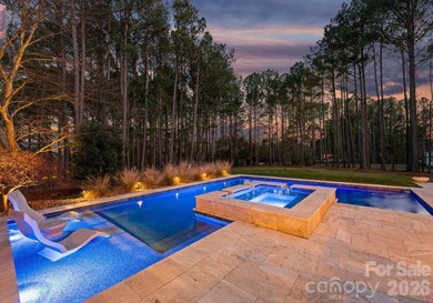 Timeless Southern charm meets lake living! Situated on a large on Trump National Golf Club Charlotte in North Carolina - for sale on GolfHomes.com, golf home, golf lot