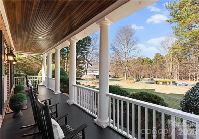 Timeless Southern charm meets lake living! Situated on a large on Trump National Golf Club Charlotte in North Carolina - for sale on GolfHomes.com, golf home, golf lot