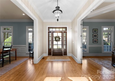 Timeless Southern charm meets lake living! Situated on a large on Trump National Golf Club Charlotte in North Carolina - for sale on GolfHomes.com, golf home, golf lot