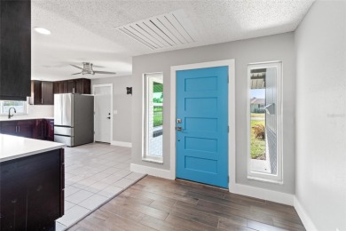 Tucked inside the coastal community of Shore Acres, this on Mangrove Bay Golf Course in Florida - for sale on GolfHomes.com, golf home, golf lot