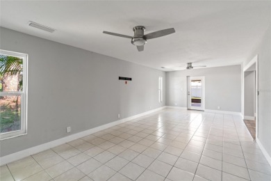 Tucked inside the coastal community of Shore Acres, this on Mangrove Bay Golf Course in Florida - for sale on GolfHomes.com, golf home, golf lot