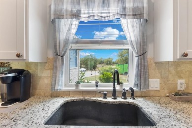 This beautifully designed stone home with blue and red accents on Lighthouse Golf Course in Texas - for sale on GolfHomes.com, golf home, golf lot