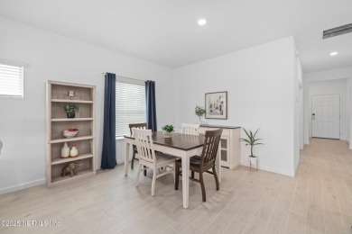 Bring your golf clubs! Experience luxury living in this gorgeous on Cimarrone Golf and Country Club in Florida - for sale on GolfHomes.com, golf home, golf lot