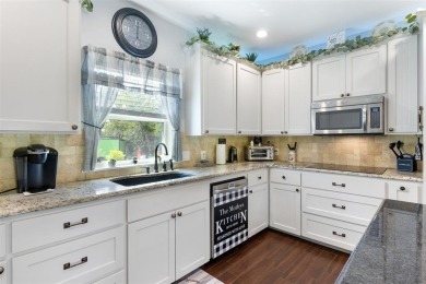This beautifully designed stone home with blue and red accents on Lighthouse Golf Course in Texas - for sale on GolfHomes.com, golf home, golf lot