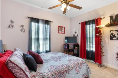 This beautifully designed stone home with blue and red accents on Lighthouse Golf Course in Texas - for sale on GolfHomes.com, golf home, golf lot
